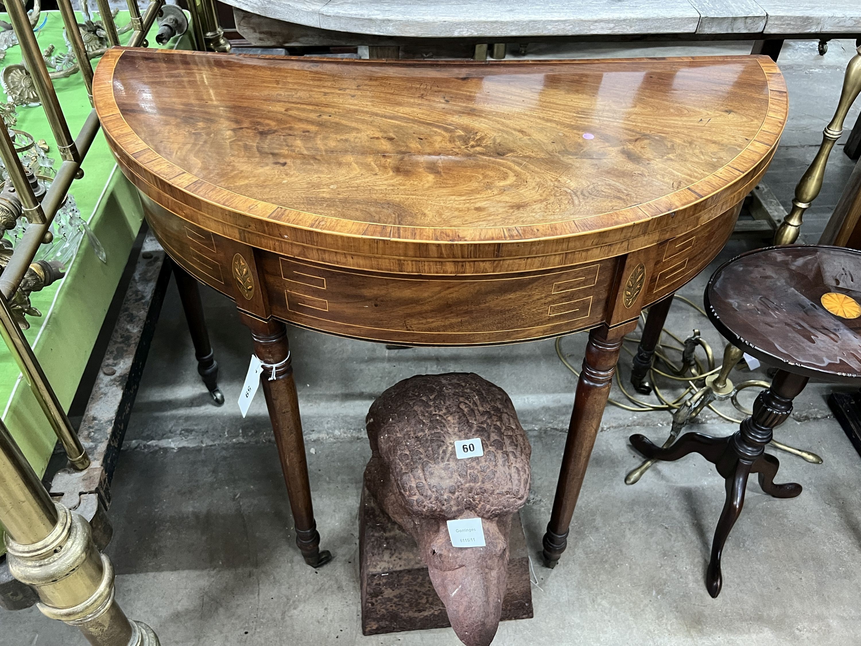 A George III banded mahogany D shaped folding card table, width 91cm, depth 46cm, height 72cm